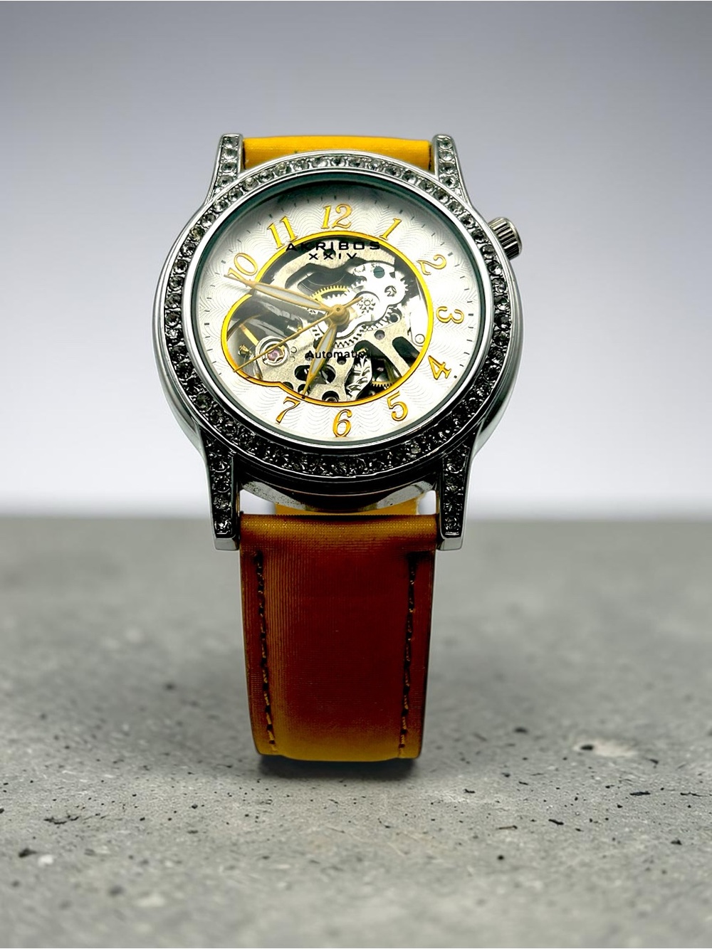 Akribos XXIV AK475YL Automatic Skeleton Womens Watch Crystal Bezel Yellow Strap